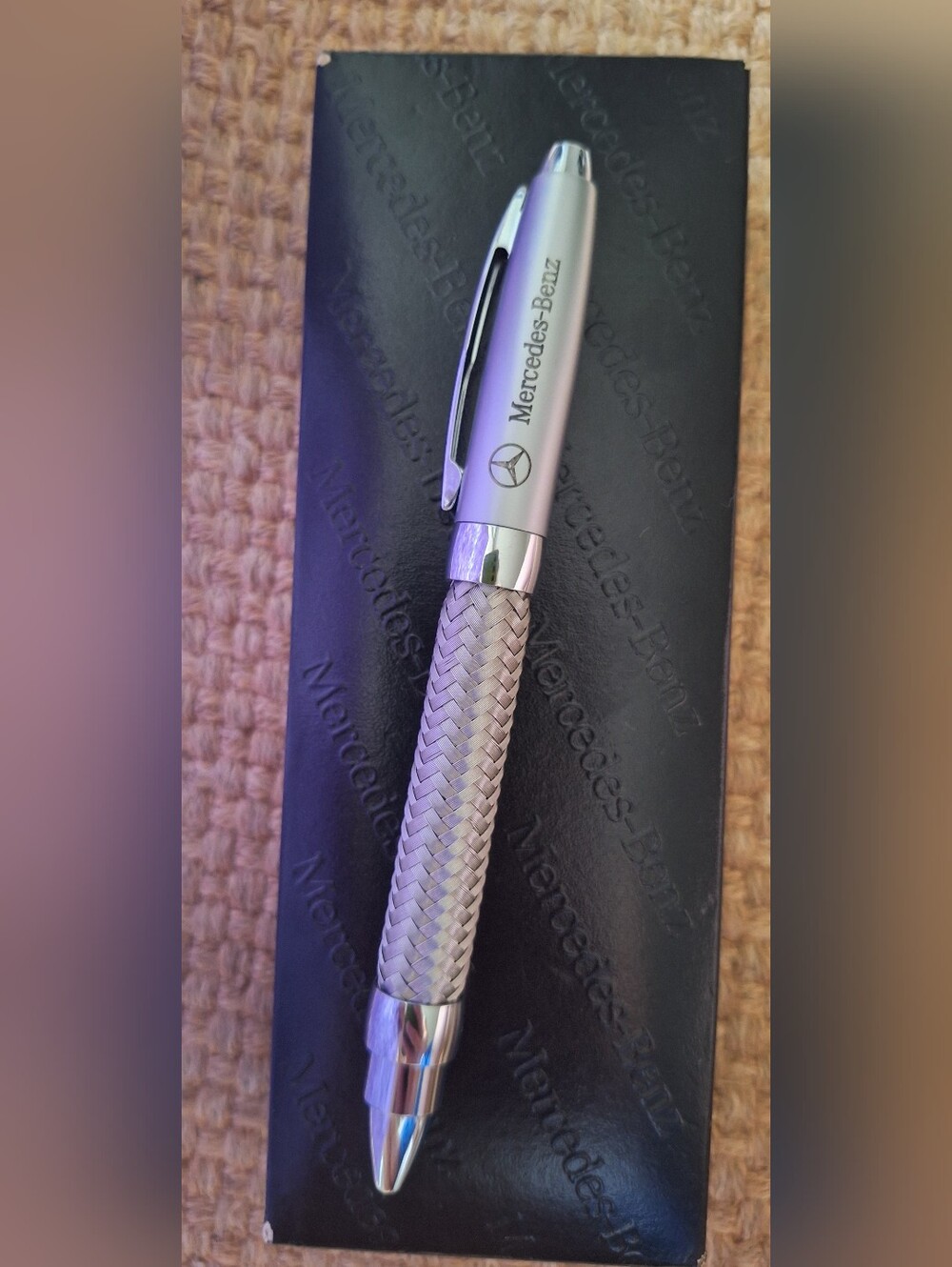 Mercedes-Benz ballpoint pen featuring a distinctive braided silver metal barrel.